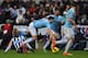 NEWCASTLE UPON TYNE, ENGLAND - JANUARY 12: Newcastle player Mapou Yanga-Mbiwa (l) fouls Samir Nasri who is later stretchered off during the Barclays Premier League match between Newcastle United and Manchester City at St James' Park on January 12, 2014 i