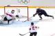 SOCHI, RUSSIA - FEBRUARY 10: Amanda Kessel #28 of United States stretches for the puck on the goal line next to Florence Schelling #41 of Switzerland during the Women's Ice Hockey Preliminary Round Group A game on day three of the Sochi 2014 Winter Olymp