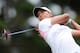 Cheyenne Woods unloads off the tee.