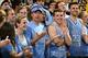 Mar 3, 2013; Chapel Hill, NC, USA; North Carolina Tar Heels head football coach Larry Fedora (wearing visor) reacts in the student section. The Tar Heels defeated the Seminoles 79-58 at the Dean E. Smith Center. Mandatory Credit: Bob Donnan-USA TODAY Spor