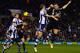 WEST BROMWICH, ENGLAND - FEBRUARY 11: Gareth McAuley of West Brom and Branislav Ivanovic of Chelsea compete for the ball during the Barclays Premier League match between West Bromwich Albion and Chelsea at The Hawthorns on February 11, 2014 in West Bromw