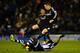 WEST BROMWICH, ENGLAND - FEBRUARY 11: Youssuf Mulumbu of West Brom tackles Fernando Torres of Chelsea during the Barclays Premier League match between West Bromwich Albion and Chelsea at The Hawthorns on February 11, 2014 in West Bromwich, England. (Ph