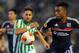 SEVILLE, SPAIN - SEPTEMBER 19: Alexandre Lacazette (R) of Olympique Lyonnais and Markus Steinhofer of Real Betis Balompie in action during the UEFA Europa League group stage match between Real Betis Balompie and Olympique Lyonnais held on September 19, 2