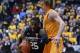 WICHITA, KS - FEBRUARY 11: Guard Anthony Beane #25 of the Southern Illinois Salukis drives against guard Ron Baker #31 of the Wichita State Shockers during the first half on February 11, 2014 at Charles Koch Arena in Wichita, Kansas. (Photo by Peter Ai