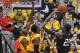 WICHITA, KS - FEBRUARY 11: Forward Cleanthony Early #11 of the Wichita State Shockers blocks the shot of guard Anthony Beane #25 of the Southern Illinois Salukis during the second half on February 11, 2014 at Charles Koch Arena in Wichita, Kansas. Wichi