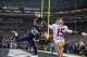 Jan 19, 2014; Seattle, WA, USA; Seattle Seahawks cornerback Richard Sherman (25) tips the ball against San Francisco 49ers wide receiver Michael Crabtree (15) for an interception by Seahawks outside linebacker Malcolm Smith (not pictured) during the fourt