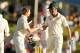 CENTURION, SOUTH AFRICA - FEBRUARY 12: Steven Smith and Shaun Marsh of Australia leave the field at the end of play during day one of the First Test match between South Africa and Australia on February 12, 2014 in Centurion, South Africa. (Photo by Morn