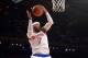 Feb 7, 2014; New York, NY, USA; New York Knicks small forward Carmelo Anthony (7) grabs a rebound against the Denver Nuggets during the first half at Madison Square Garden. Mandatory Credit: Joe Camporeale-USA TODAY Sports