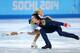 SOCHI, RUSSIA - FEBRUARY 11: Tatiana Volosozhar and Maxim Trankov of Russia compete during the Figure Skating Pairs Short Program on day four of the Sochi 2014 Winter Olympics at Iceberg Skating Palace on February 11, 2014 in Sochi, Russia. (Photo by Pa