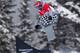 LAKE LOUISE, CANADA - DECEMBER 20: Nick Baumgartner of the U.S. takes to the air during the men's qualification run at the FIS Snowboard Cross World Cup December 20, 2013 in Lake Louise, Alberta, Canada. (Photo by Todd Korol/Getty Images)