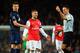 LONDON, ENGLAND - FEBRUARY 12: Jack Wilshere (C) of Arsenal appeals to match referee Mark Clattenburg during the Barclays Premier League match between Arsenal and Manchester United at the Emirates Stadium on February 12, 2014 in London, England. (Photo