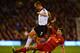 LONDON, ENGLAND - FEBRUARY 12: Steven Gerrard of Liverpool tackles Steve Sidwell of Fulham during the Barclays Premier League match between Fulham and Liverpool at Craven Cottage on February 12, 2014 in London, England. (Photo by Mike Hewitt/Getty Images