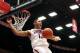 TUCSON, AZ - JANUARY 26: Nick Johnson #13 of the Arizona Wildcats slam dunks the ball against the Utah Utes during the second half of the college basketball game at McKale Center on January 26, 2014 in Tucson, Arizona. The Wildcats defeated the Utes 65-
