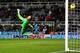 NEWCASTLE UPON TYNE, ENGLAND - FEBRUARY 12: Tim Krul of Newcastle United dives but fails to save Nacer Chadli of Tottenham Hotspur's effort on goal during the Barclays Premier League match between Newcastle United and Tottenham Hotspur at St James' Park