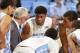 Jan 8, 2014; Chapel Hill, NC, USA; North Carolina Tar Heels head coach Roy Williams talks in the huddle with guards Marcus Paige (5) and Nate Britt (0) and forwards Isaiah Hicks (22) and James Michael McAdoo (43) and forward J.P. Tokoto (13) in the second