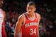 HOUSTON, TX - JANUARY 18: Giannis Antetokounmpo #34 of the Milwaukee Bucks reacts to a play against the Houston Rockets on January 18, 2014 at the Toyota Center in Houston, Texas. NOTE TO USER: User expressly acknowledges and agrees that, by downloading
