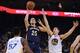 December 17, 2013; Oakland, CA, USA; New Orleans Pelicans shooting guard Austin Rivers (25) shoots the ball against Golden State Warriors shooting guard Klay Thompson (11) during the fourth quarter at Oracle Arena. The Warriors defeated the Pelicans 104-9