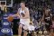 Feb 12, 2014; Oakland, CA, USA; Golden State Warriors forward David Lee (10) moves the ball past Miami Heat guard Ray Allen (34) in the third quarter at Oracle Arena. The Heat defeated the Warriors 111-110. Mandatory Credit: Cary Edmondson-USA TODAY Sport