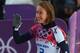 SOCHI, RUSSIA - FEBRUARY 13: Lizzy Yarnold of Great Britain waves after her run during the Women's Skeleton heats on Day 6 of the Sochi 2014 Winter Olympics at Sliding Center Sanki on February 13, 2014 in Sochi, Russia. (Photo by Alex Livesey/Getty Imag