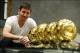 Messi with his Ballon d'Ors.