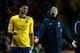 SOUTHAMPTON, ENGLAND - JANUARY 28: Arsene Wenger manager of Arsenal reacts s he looks to Olivier Giroud of Arsenal during the Barclays Premier League match between Southampton and Arsenal at St Mary's Stadium on January 28, 2014 in Southampton, England.