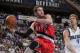 DALLAS, TX - APRIL 16: Rudy Fernandez #5 of the Portland Trail Blazers passes against Dirk Nowitzki #41 of the Dallas Mavericks during Game One of the Western Conference Quarterfinals in the 2011 NBA Playoffs on April 16, 2011 at the American Airlines Ce