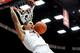 Jan 26, 2014; Tucson, AZ, USA; Arizona Wildcats guard Nick Johnson (13) dunks the ball during the second half against the Utah Utes at McKale Center. Arizona won 65-56. Mandatory Credit: Casey Sapio-USA TODAY Sports