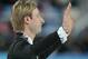 Plushenko waves goodbye to his Russian fans.