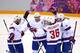 SOCHI, RUSSIA - FEBRUARY 13: Per-Aage Skroeder #19, Patrick Thoresen #41 of Norway Mats Zuccarello Aasen #36 of Norway celebrate with teammates after Mathis Olimb #46 of Norway scored a goal against Canada during the Men's Ice Hockey Preliminary Round Gr