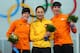 SOCHI, RUSSIA - FEBRUARY 13: (L-R) Silver medalist Ireen Wust of the Netherlands, gold medalist Hong Zhang of China and bronze medalist Margot Boer of the Netherlands celebrate on the podium during the flower ceremony for the Speed Skating Women's 1000m