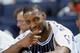 OAKLAND, CA - MARCH 17: Tracy McGrady #1 of the Orlando Magic enjoys a moment during the NBA game against the Golden State Warriors at The Arena in Oakland on March 17, 2004 in Oakland, California. The Warriors won 110-85. NOTE TO USER: User expressly a