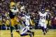 Jan 5, 2013; Green Bay, WI, USA; Green Bay Packers tight end Jermichael Finley (88) is unable to make a catch in the end zone while being defended by Minnesota Vikings defender in the second quarter of the NFC Wild Card playoff game at Lambeau Field. Mand