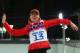 SOCHI, RUSSIA - FEBRUARY 14: gold medalist Darya Domracheva of Belarus celebrates on the podium during the flower ceremony for the Women's 15 km Individual during day seven of the Sochi 2014 Winter Olympics at Laura Cross-country Ski & Biathlon Center on