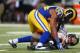 ST. LOUIS, MO - DECEMBER 22: Robert Quinn #94 of the St. Louis Rams sacks Mike Glennon #8 of the Tampa Bay Buccaneers at the Edward Jones Dome on December 22, 2013 in St. Louis, Missouri. The Rams beat the Buccaneers 23-13. (Photo by Dilip Vishwanat/Get