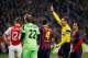 AMSTERDAM, NETHERLANDS - NOVEMBER 26: Referee, Pavel Kralovec of Czech Republic shows Joel Veltman (#12) of Ajax a red card after he tackles and gives away a penalty on Neymar of Barcelona during the UEFA Champions League Group H match between Ajax Amste