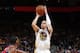 OAKLAND, CA - JANUARY 28: Stephen Curry #30 of the Golden State Warriors shoots against John Wall #2 of the Washington Wizards on January 28, 2014 at Oracle Arena in Oakland, California. NOTE TO USER: User expressly acknowledges and agrees that, by downlo