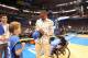 OKLAHOMA CITY, OK - JUNE 12: Russell Westbrook #0 of the Oklahoma City Thunder signs a hat for a young fan prior to the start against the Miami Heat in Game One of the 2012 NBA Finals at Chesapeake Energy Arena on June 12, 2012 in Oklahoma City, Oklahoma.