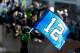 SEATTLE - FEBRUARY 05: Fans wave the 12th Man flag to celebrate Seattle Seahawks victory in Super Bowl XLVII during a parade on February 5, 2014 in Seattle, Washington. (Photo by Jonathan Ferrey/Getty Images)