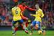 LIVERPOOL, ENGLAND - FEBRUARY 08: Daniel Sturridge of Liverpool is challenged by Laurent Koscielny and Jack Wilshere of Arsenal during the Barclays Premier League match between Liverpool and Arsenal at Anfield on February 8, 2014 in Liverpool, England.