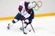 SOCHI, RUSSIA - FEBRUARY 13: Zach Parise #9 of United States controls the puck against Slovakia during the Men's Ice Hockey Preliminary Round Group A game on day six of the Sochi 2014 Winter Olympics at Shayba Arena on February 13, 2014 in Sochi, Russia.