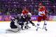SOCHI, RUSSIA - FEBRUARY 15: Alexander Syomin #28 of Russia shoots the puck against Jonathan Quick #32 of United States during the Men's Ice Hockey Preliminary Round Group A game on day eight of the Sochi 2014 Winter Olympics at Bolshoy Ice Dome on Febru