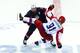 SOCHI, RUSSIA - FEBRUARY 15: Dustin Brown #23 of the United States collides wih Vladimir Tarasenko #91 of Russia during the Men's Ice Hockey Preliminary Round Group A game on day eight of the Sochi 2014 Winter Olympics at Bolshoy Ice Dome on February 15,