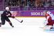 SOCHI, RUSSIA - FEBRUARY 15: T.J. Oshie #74 of the United States scores on a shootout against Sergei Bobrovski #72 of Russia to win the Men's Ice Hockey Preliminary Round Group A game on day eight of the Sochi 2014 Winter Olympics at Bolshoy Ice Dome on