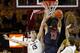 TEMPE, AZ - FEBRUARY 14: Jordon Bachynski #13 of the Arizona State Sun Devils looks to block the shot of Nick Johnson #13 of the Arizona Wildcats during the overtime period of a college basketball game at Wells Fargo Arena on February 14, 2014 in Tempe,