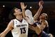Feb 14, 2014; Tempe, AZ, USA; Arizona State Sun Devils center Jordan Bachynski (13) and Arizona Wildcats forward Aaron Gordon (11) battle for the ball during the first half at Wells Fargo Arena. Mandatory Credit: Rick Scuteri-USA TODAY Sports