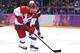SOCHI, RUSSIA - FEBRUARY 15: Pavel Datsyuk #13 of Russia controls the puck against the United States during the Men's Ice Hockey Preliminary Round Group A game on day eight of the Sochi 2014 Winter Olympics at Bolshoy Ice Dome on February 15, 2014 in Soc