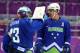 SOCHI, RUSSIA - FEBRUARY 15: Robert Kristan #33 of Slovenia celebrates with Anze Kopitar #11 after defeating Slovakia 3-1 during the Men's Ice Hockey Preliminary Round Group A game on day eight of the Sochi 2014 Winter Olympics at Bolshoy Ice Dome on Feb