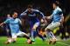 MANCHESTER, ENGLAND - FEBRUARY 15: Eden Hazard (C) of Chelsea holds off the challenge of Pablo Zabaleta (L) and James Milner (R) of Manchester City during the FA Cup Fifth Round match between Manchester City and Chelsea at the Etihad Stadium on February