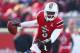 LOUISVILLE, KY - NOVEMBER 23: Teddy Bridgewater #5 of the Louisville Cardinals avoids the tackle of Chase Rome #47 of the Memphis Tigers at Papa John's Cardinal Stadium on November 23, 2013 in Louisville, Kentucky. (Photo by Andy Lyons/Getty Images)
