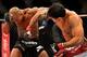 Feb 15, 2014; Jaragua do Sul, SC, Brazil; Viscardi Andrade (red gloves) fights against Nico Musoke (blue gloves) during UFC Fight Night Machida vs Mousasi at Arena Jaragua. Mandatory Credit: Jason Silva-USA TODAY Sports